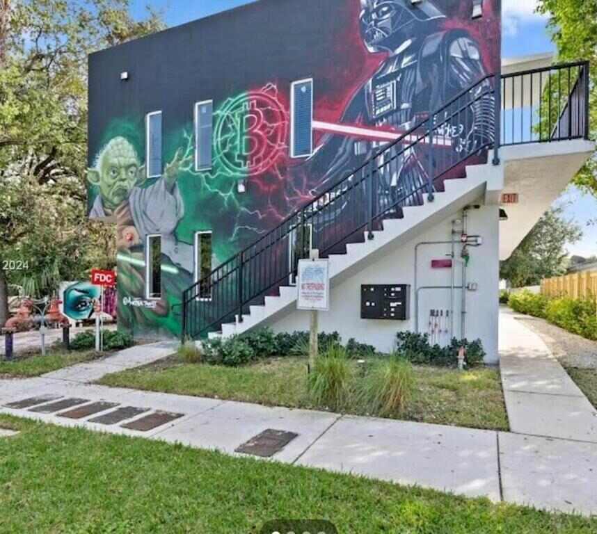 Atrium Star Wars-themed Design District building with a painted mural in Miami